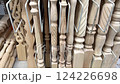 Explore a variety of wooden balusters and intricately carved elements that are ideal for diverse woodworking projects 124226698