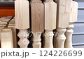 Explore a variety of wooden balusters and intricately carved elements that are ideal for diverse woodworking projects 124226699