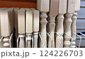 Explore a variety of wooden balusters and intricately carved elements that are ideal for diverse woodworking projects 124226703