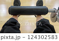 the legs of a lower-body athlete at a pitless club 124302583