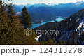 Breathtaking mountain view showing lake and forest in a serene landscape on a sunny day 124313278