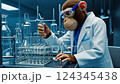 anthropomorphic chimpanzee scientist in the lab 124345438