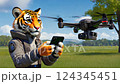 portrait tiger controls drone with phone 124345451