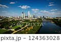 Future cityscape: Skyscrapers, smart city with people coming and going CG background 124363028