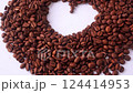 This artistic arrangement features roasted coffee beans shaped into a heart, symbolizing the love for coffee. Perfect for coffee enthusiasts and trendy food 124414953