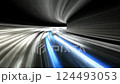 Dynamic light trails racing through a futuristic tunnel in motion 124493053
