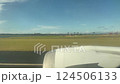 The scene of the plane taking off as seen from the window 124506133