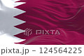 Detail of the Qatar national flag fluttering. The flag is maroon with a wide white wedge-shaped band. Seamless 3d render animation. Slow motion loop. Selective focus. 124564225