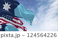 close-up of Minnesota new state flags waving with the american flag on a clear day. Seamless 3d render animation. Slow motion loop. Selective focus. 124564226