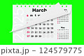 Calendar for 2025 new year from january to december flipping through month. Close up of flipped calendar page change on green background. Chroma key. 4k video graphic motion 124579775