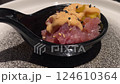 Fresh Tuna Tartare with Sauce Served at a Japanese Restaurant 124610364