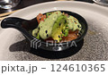Fresh Salmon Tartare with Sauce Served at a Japanese Restaurant 124610365