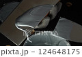 Applying Gray Paste with a Metal Scraper for Various Projects and Effects 124648175