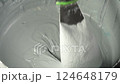 Mixing a textured gray paste for artistic and construction use 124648179