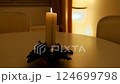 Lit Christmas advent candle whith numbers. Christmas decor and holiday preparations 124699798