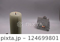 Put out flame of Christmas advent candle whith numbers.  124699801