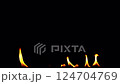 Flames are burning isolated on a black background. Concept of particles, sparkles, flame and light 124704769