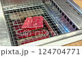 The meat is grilled on the electric grill 124704771