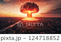 Nuclear mushroom cloud rising over urban skyline, devastating city buildings and generating immense destruction during simulated apocalyptic nuclear weapon scenario 124718852