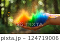 close-up in hand explosion multicolored powder holi fly away 124719006