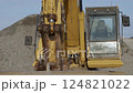 Excavator Cabin Panning, yellow Heavy Equipment on Construction site 124821022