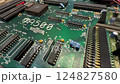 computer circuit board on disassembled gaming computer Amiga 500 124827580