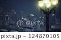Mysterious cemetery illuminated by vintage lamps during foggy night 124870105