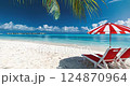 Beach deck chair with red umbrella on sand beach in sunny sky background 124870964