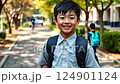 little asian kid in school uniform with backpack on school background, smiling japanese boy on street, chinese teenager, korean student, child 124901124
