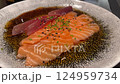 Close-up of Salmon and Tuna Carpaccio with Marinade at Restaurant 124959734
