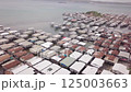Aerial drone shot of Hanuabada village in Capital City Port Moresby, Papua New Guinea. Koki Stilt village. Motu tribe. Plenty of garbage everywhere. High quality 4k footage 125003663
