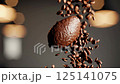 Premium Coffee Grounds Falling in 4K - Aromatic Coffee Powder Motion Art A stunning 4K slow-motion capture of premium coffee grounds falling and forming a perfect mound against a dark background. 125141075
