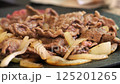 Meat onion cooking image 125201265