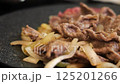 Meat onion cooking image 125201266