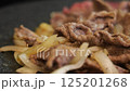 Meat onion cooking image 125201268