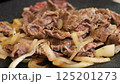 Meat onion cooking image 125201273