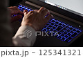 Laptop typing dark image 125341321