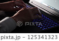 Laptop typing dark image 125341323