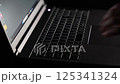 Laptop typing dark image 125341324