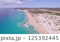 Drone View of Peaceful Golden Beach with White Sand and Clear Sea in Karpaz, Northern Cyprus 125392445