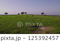 Green Fields and Mountain Peaks: A Drone's Aerial Exploration on a Sunny Day, Arapkoy, Girne, Cyprus - 20 Jun 2024 125392457