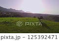 Aerial Drone Journey Over a Verdant Field in the Mountains on a Clear Sunny Day, Arapkoy, Girne, Cyprus - 20 Jun 2024 125392471