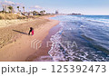Leisurely Walk with a Dog on Long Beach in Iskele, Northern Cyprus - 15 Jun 2024 125392473