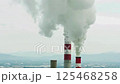 Reflection of smoke swirling in a factory chimney.AI Generated 125468258