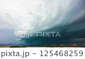 Thick clouds swiftly moving across the open sky.AI Generated 125468259