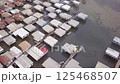 Aerial drone shot of Hanuabada village in Capital City Port Moresby, Papua New Guinea. Koki Stilt village. Motu tribe. Plenty of garbage everywhere. High quality 4k footage 125468507