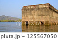 Landscape of Songkaria river with old structure of Wat Wang Wiwekaram underwater from building a dam is a travel unseen in Sangkhla buri Kanchanaburi, Thailand 125567050