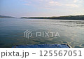 Tourist by sailing on Songkaria river by long tail boat with sun light in evening time when vacation travel for relax 125567051
