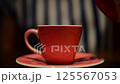 Steaming hot chinese tea being poured from traditional teapot into cup creating aromatic vapor perfect for morning breakfast or relaxing tea break time soothing ritual 125567053