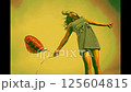 Dancing girl with balloon 125604815
